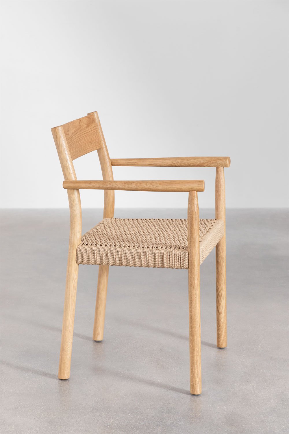 Set da tavolo ovale in cemento (220x95 cm) Noemi e 8 sedie da pranzo in legno di rovere e corda intrecciata Mara