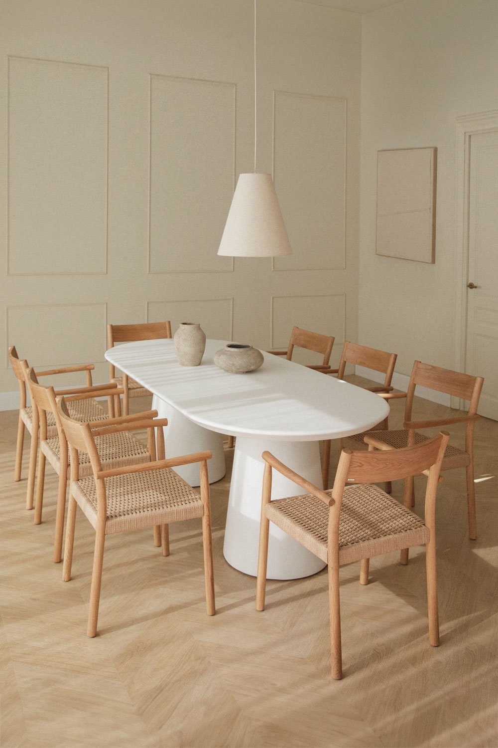 Set da tavolo ovale in cemento (220x95 cm) Noemi e 8 sedie da pranzo in legno di rovere e corda intrecciata Mara