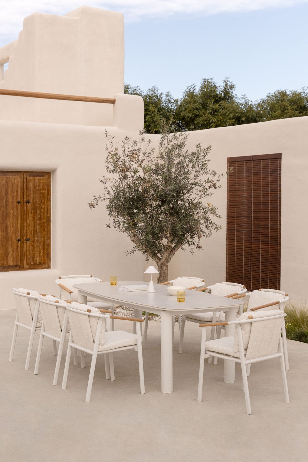 Set tavolo rettangolare allungabile 220-280x100 cm in ceramica Zinti e 8 sedie da giardino in alluminio e tessuto bouclé Yervin