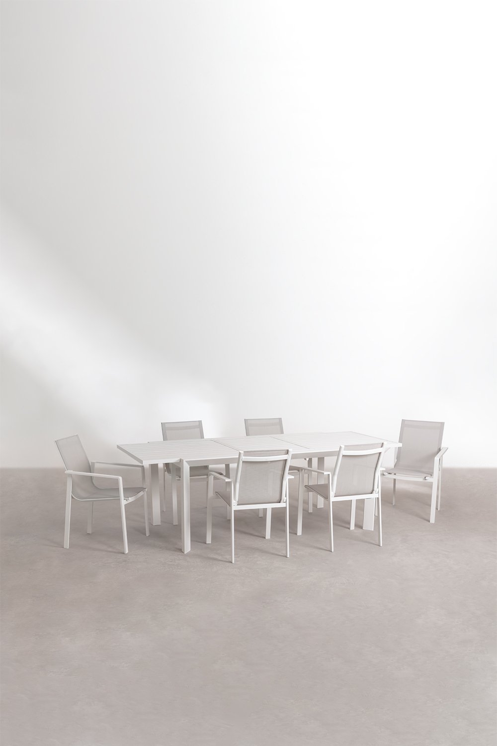 Set tavolo rettangolare allungabile Starmi, 180-240x100 cm, in alluminio e 6 sedie da giardino Eika.